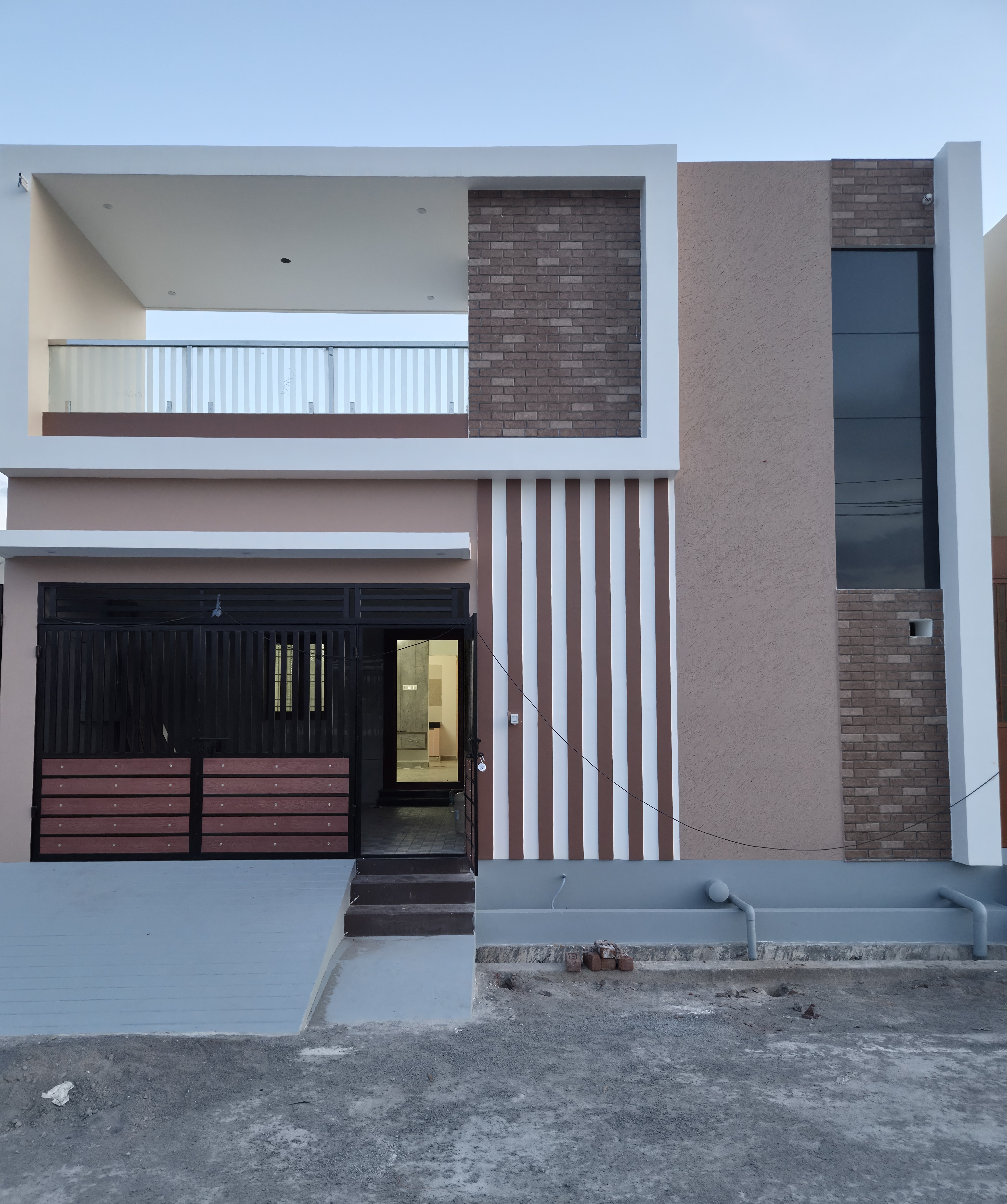 A grand classical architectural facade representing Anandh Builders heritage